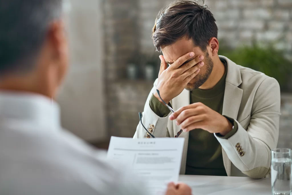 policyholder reviewing insurance claim documents after an accident